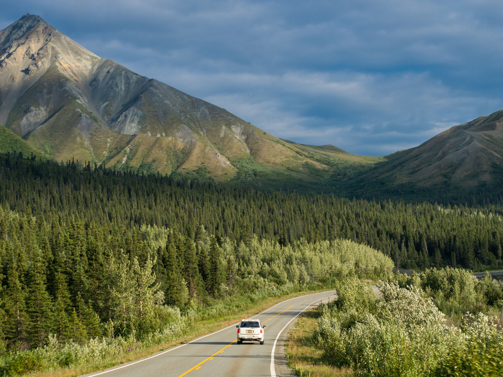 Car driving on Alaskan highway