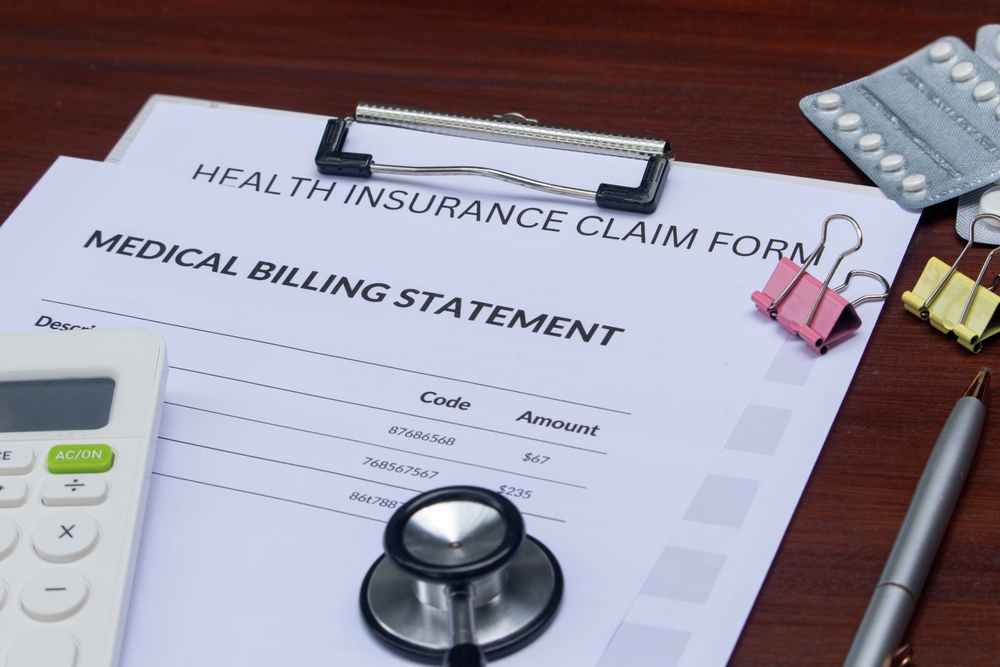 Stylized image of a medical billing statement on a clipboard